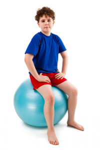 Boy on exercise ball